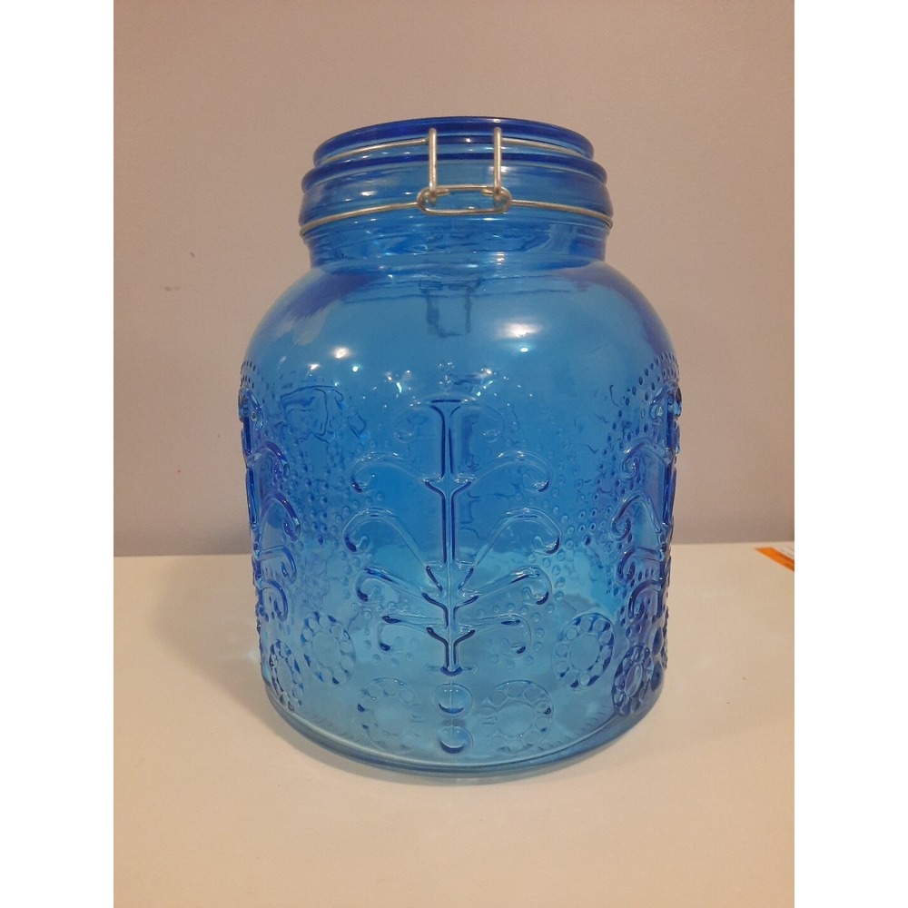 Collectible Teal blue Glass Cookie Jar wire clamp Lid embossed scrolls 9×7